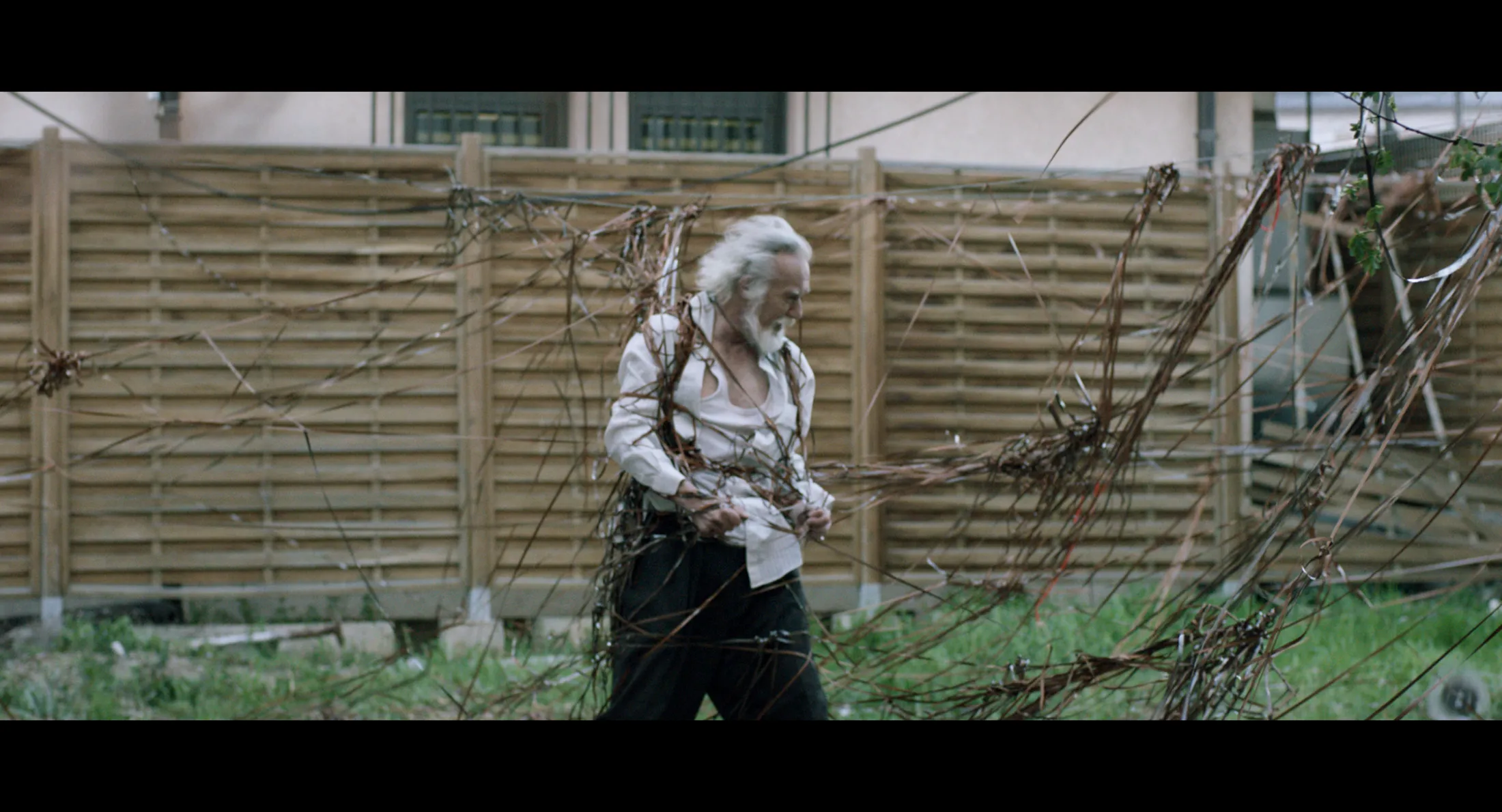 Selman Jusufi gets tangled up in the garden with some old tape recordings in the feature film Eho