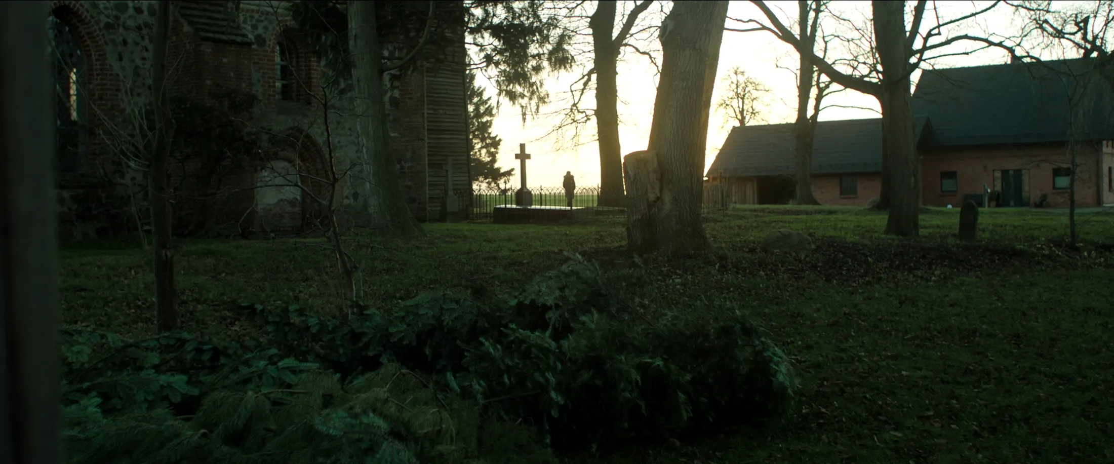 Film scene from ‘The desert left behind’ at the cemetery